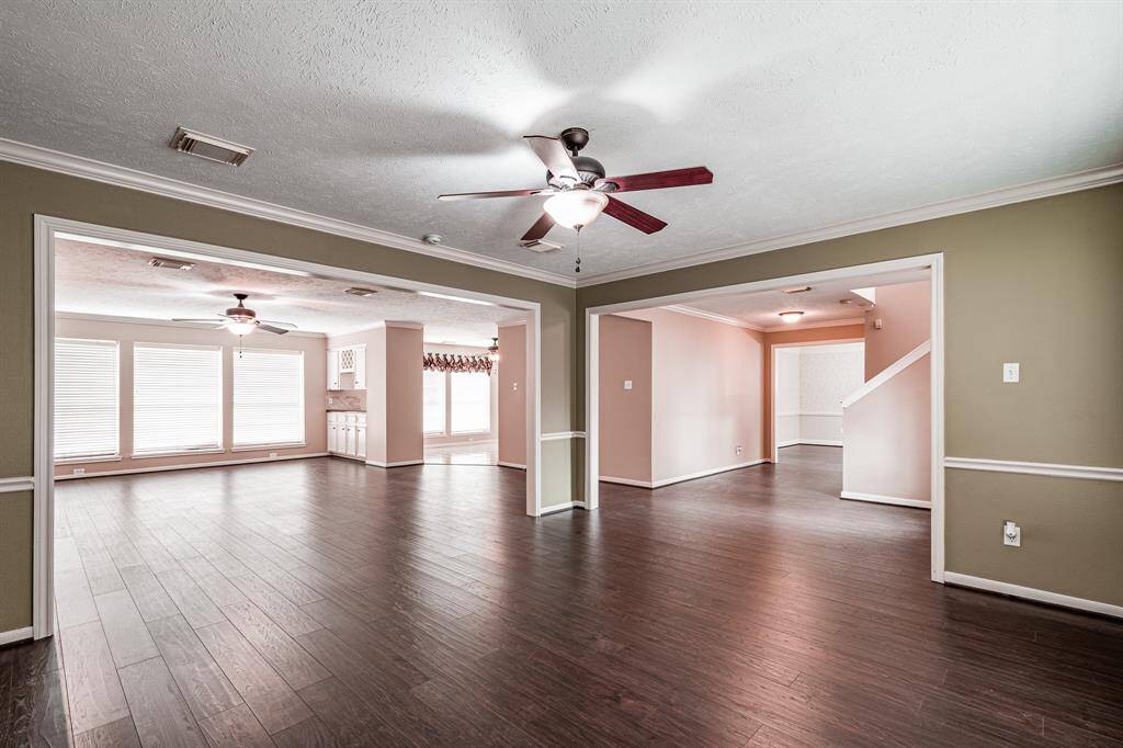 Living area to the left and dining room to the right.