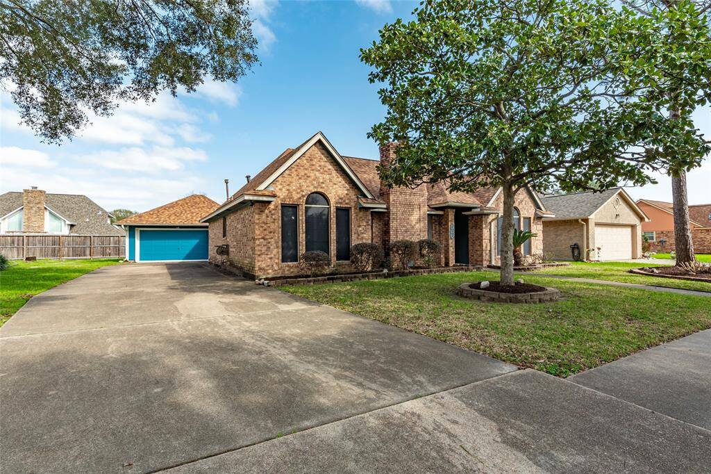 Long driveway to 2 Car Detached Garage