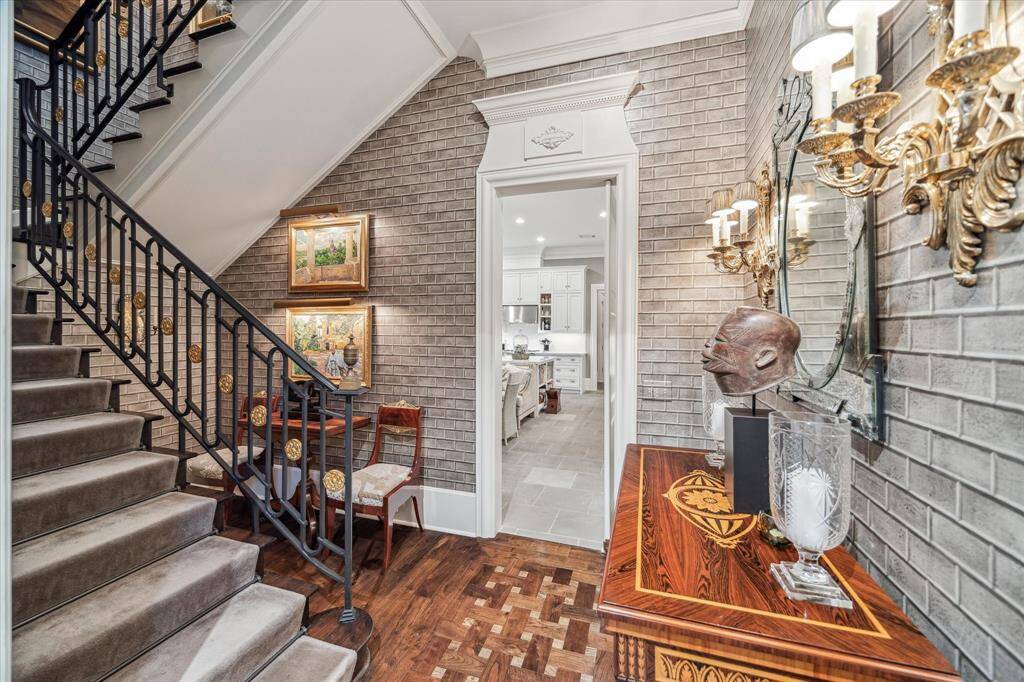 Stairway leading up to the second floor bedrooms and living spaces.