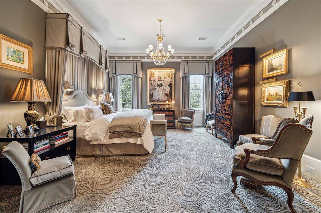 Primary suite with handmade Hokanson Co. carpet, custom draperies and high ceiling.