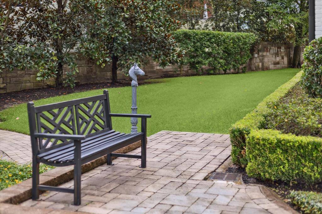 Stunning grounds with manicured gardens and hardscapes.
