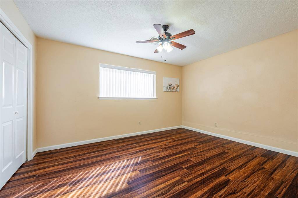 The third bedroom is also very spacious and includes a ceiling fan for added comfort.