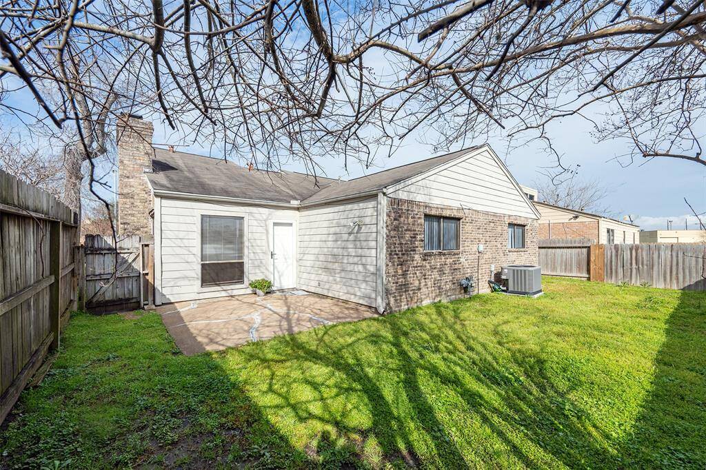 The large backyard offers plenty of space for outdoor activities and includes a second patio, perfect for entertaining or relaxing.