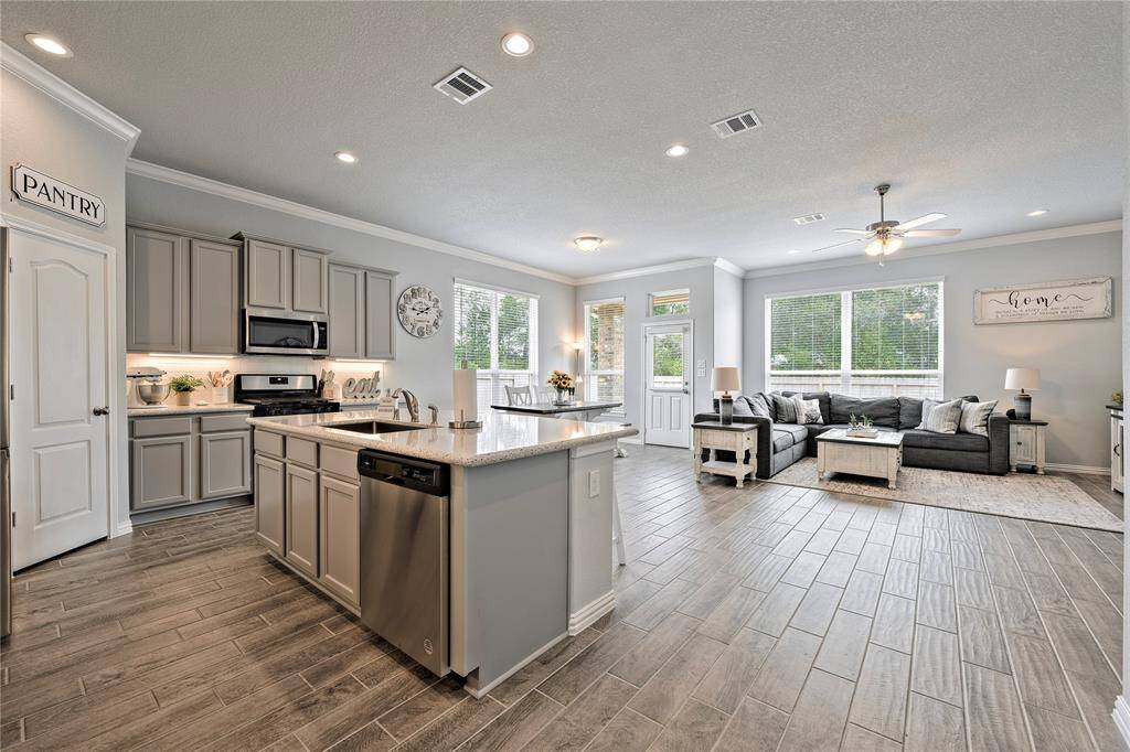 Kitchen with view of dining and living areas