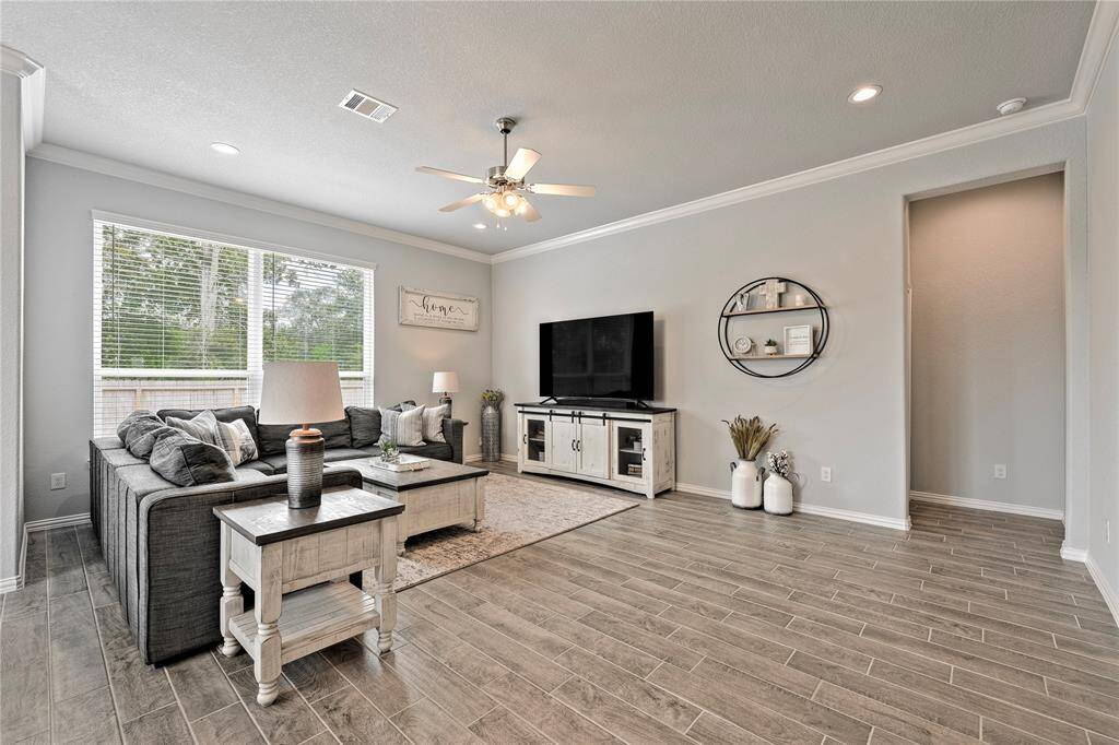 Living area with views of the oversized backyard