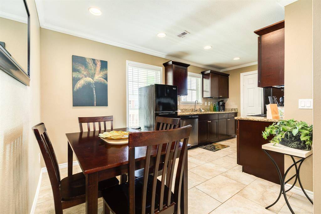 Dining area and view into the kitchen.