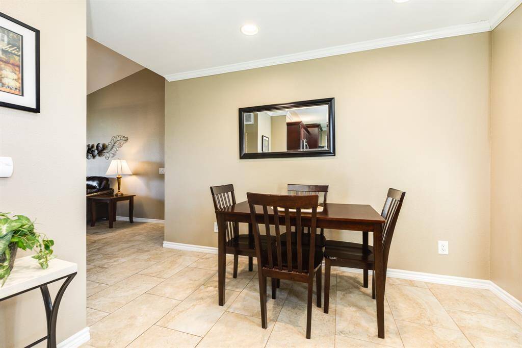 Dining area, tile floors are found through the apartment.