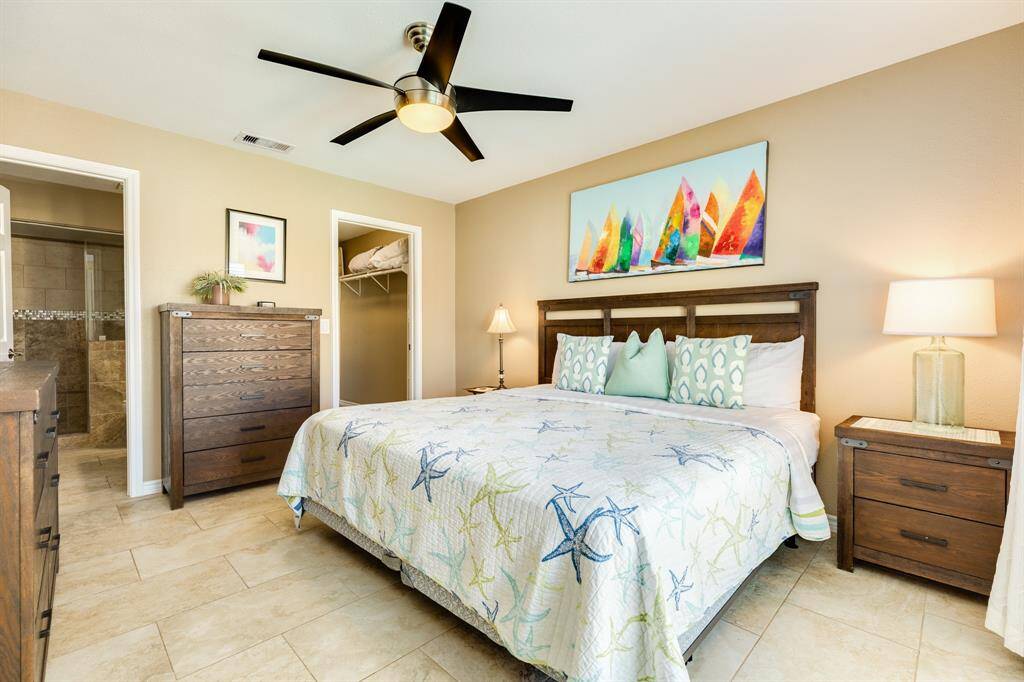 Nothing cramped about this bedroom! You will also appreciate the large walk in closet.