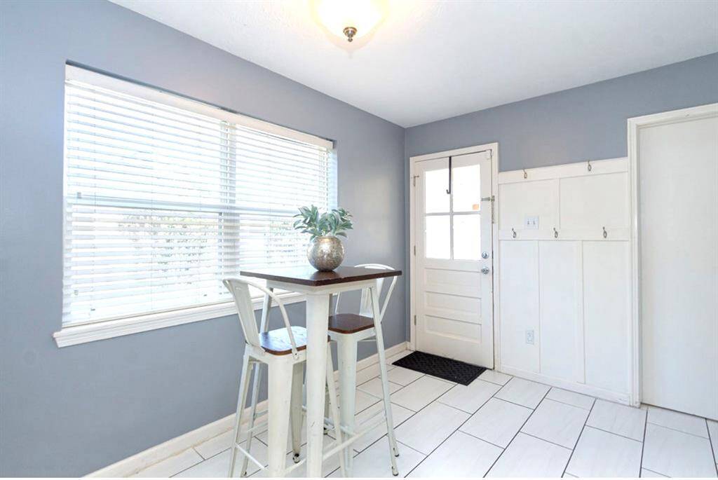 The Breakfast Room is located off of the kitchen and provides backyard access to the garage/driveway. A mud space was added between the entrance and the laundry room!