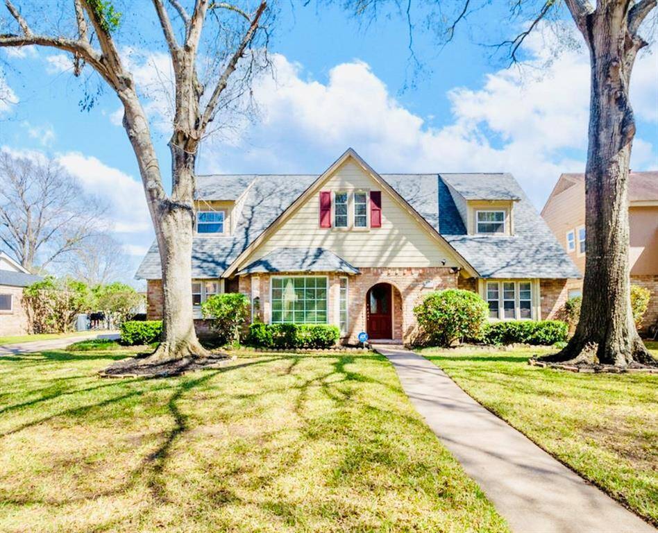 This home has fabulous mature trees and professional landscaping for a low maintenance yard! A warm red door welcomes everyone to your covered porch! Notice the Low E Double Pane Windows that are located throughout the home!