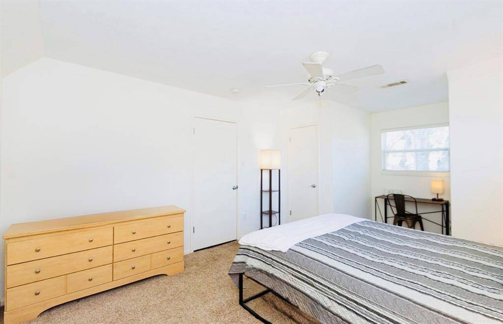 Bedroom 4 is a large beautiful space that can hold your big furniture! Photo enhanced.
