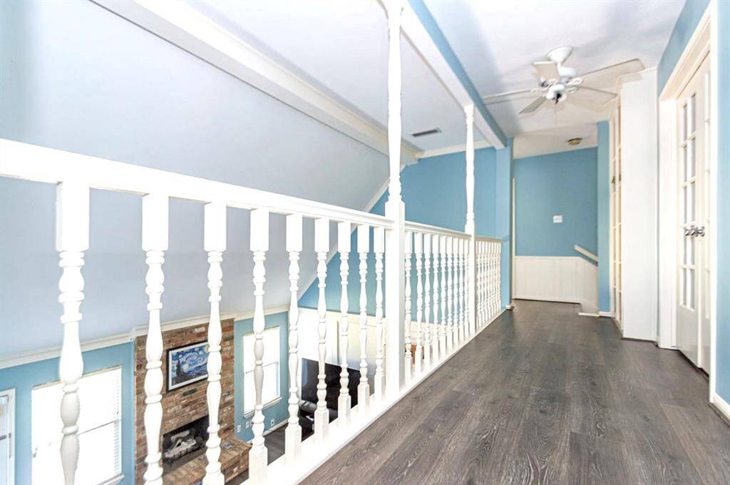 The hallway to the bedrooms overlooks the Family Room!