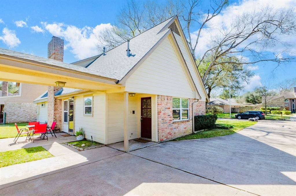 The covered porch allows access to the covered walkway to the garage.