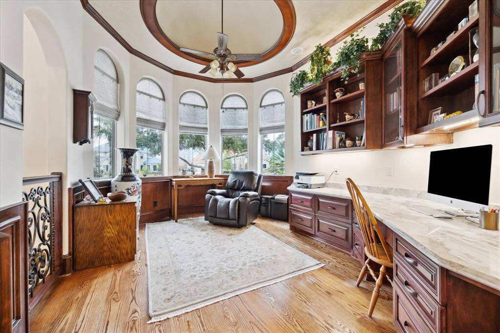 Tile and wood flooring flows through this open concept kitchen-breakfast room-family room area.  This is the heart of the home and an deal area for family living and entertaining.