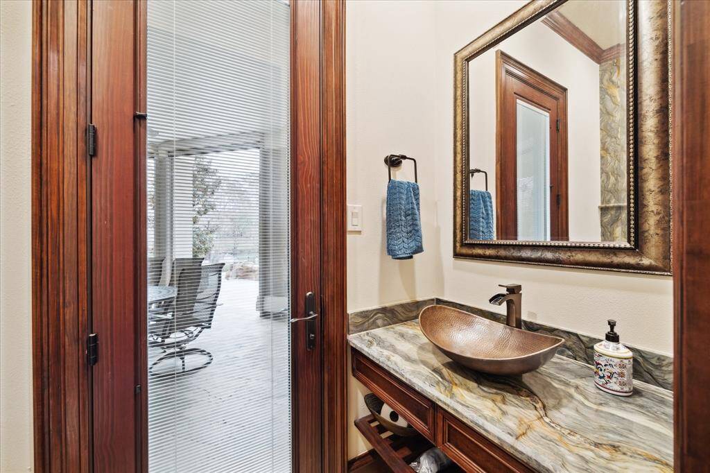 This is one of the two half bathrooms