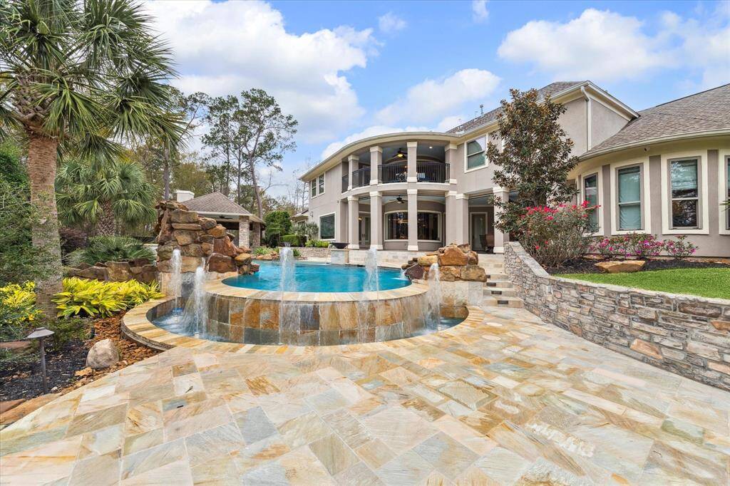 The elegant two-story exterior offers ample windows for natural light, creating a perfect oasis for relaxation and entertainment. There are 6 cameras included with the security system.  Roof was replaced in 2018. There is a 9 station home audio system. There are double pane Pella windows throughout the home and doors with two lock latches