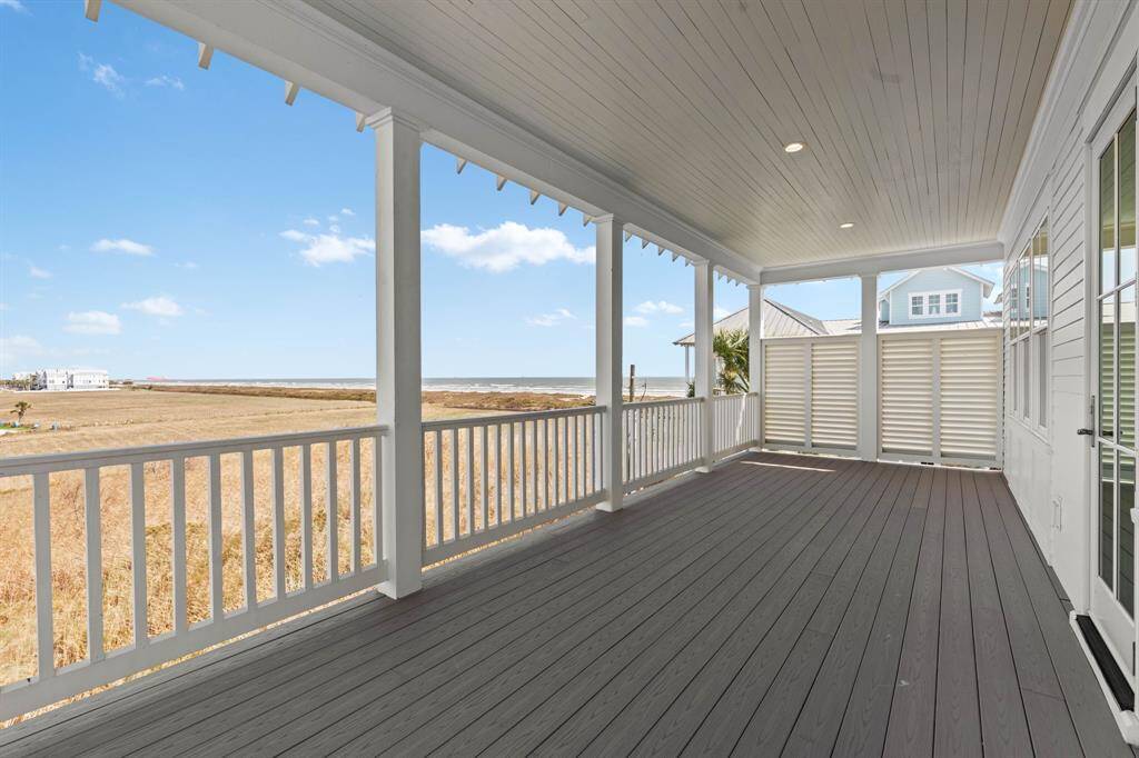 Covered porch off Great Room offers serene views.