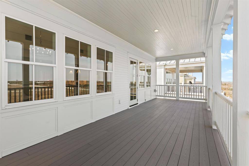 Additional view of covered porch off Great Room. All porches offer Azek decking.