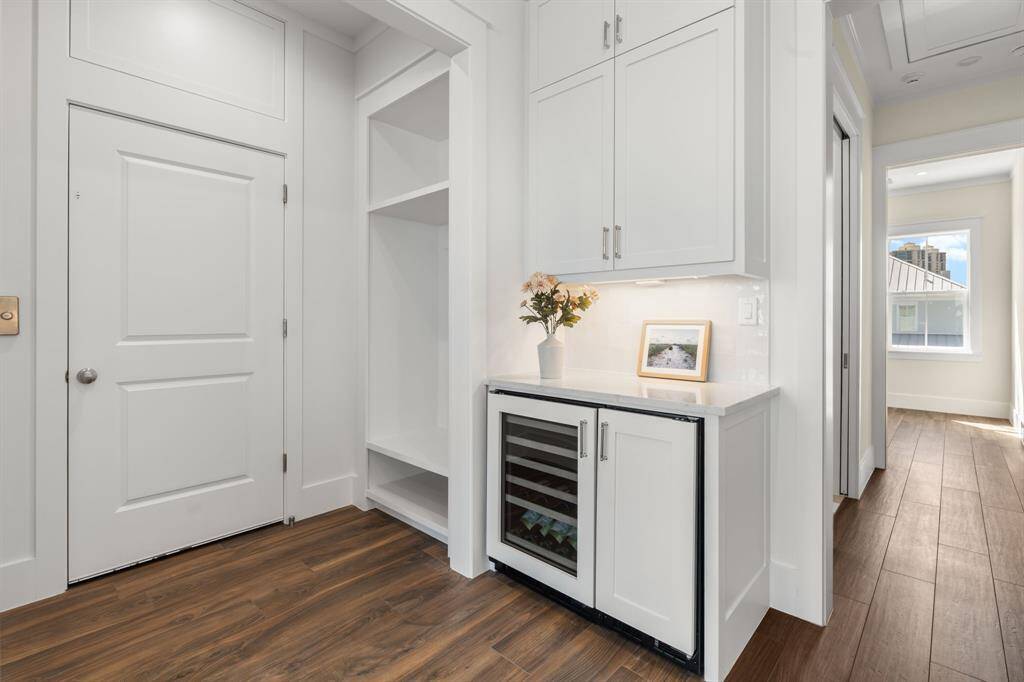 Bar Area features an ice maker and wine refrigerator