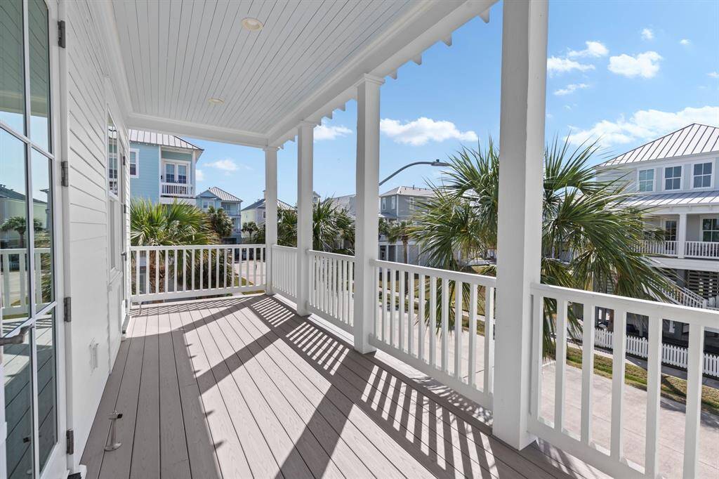 Covered porch accessible from 2 secondary bedrooms.