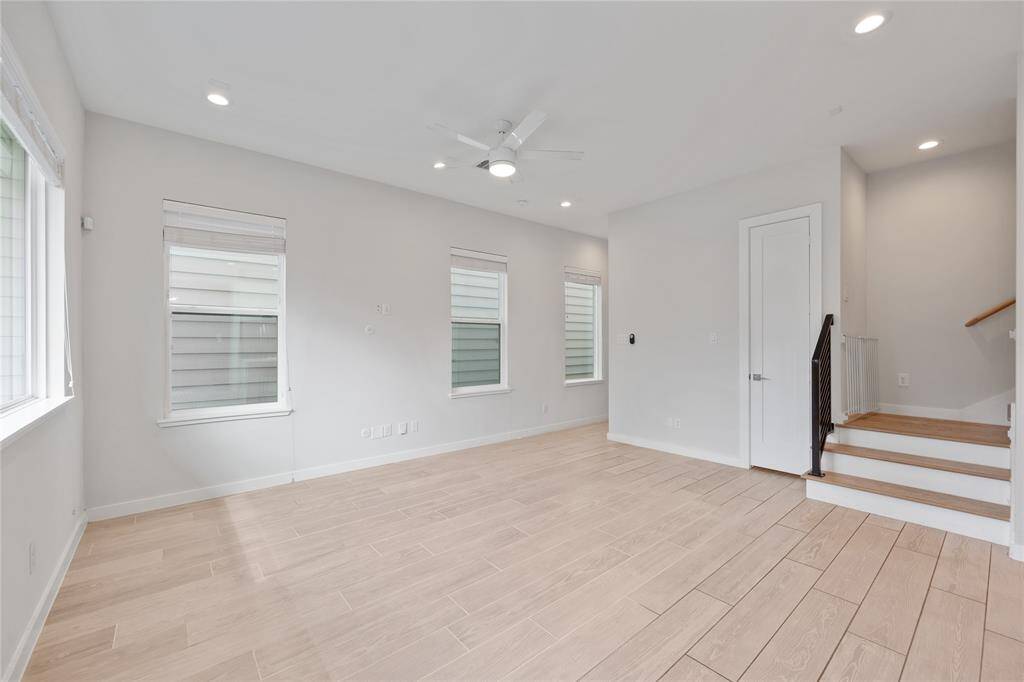 Notice the wall of windows continue into the living area!