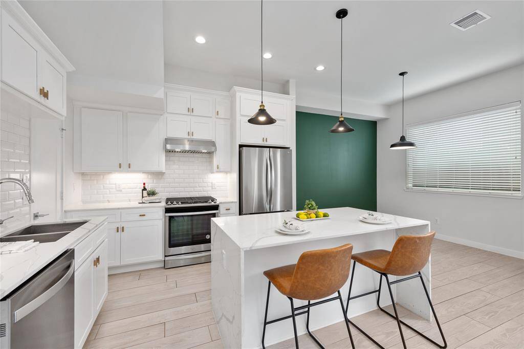 Tons of countertop space and cabinets in this Chef's Kitchen!