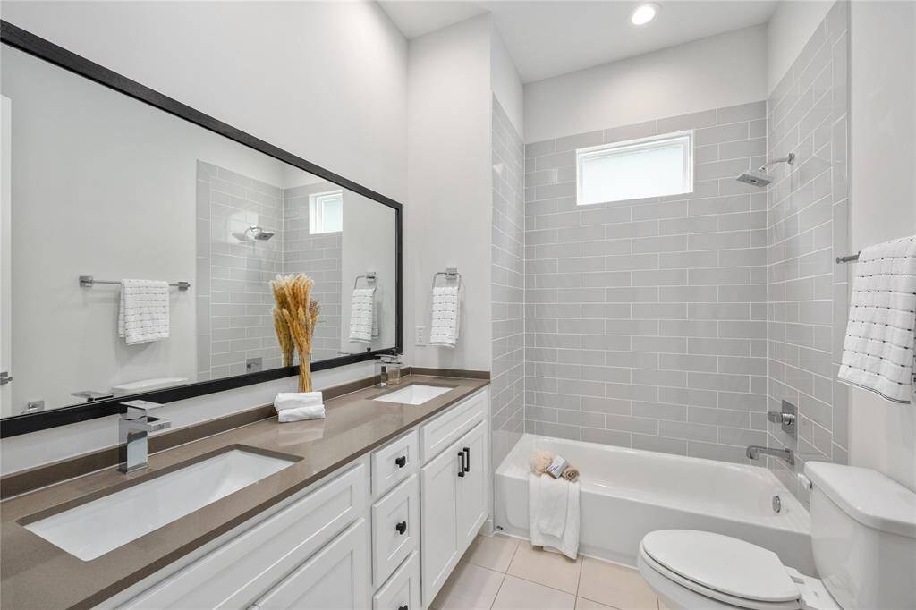 2nd Full Bathroom features double sinks, and shower/tub combo.