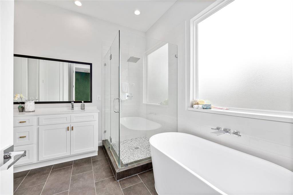 Just take a look at this luxurious primary bathroom!