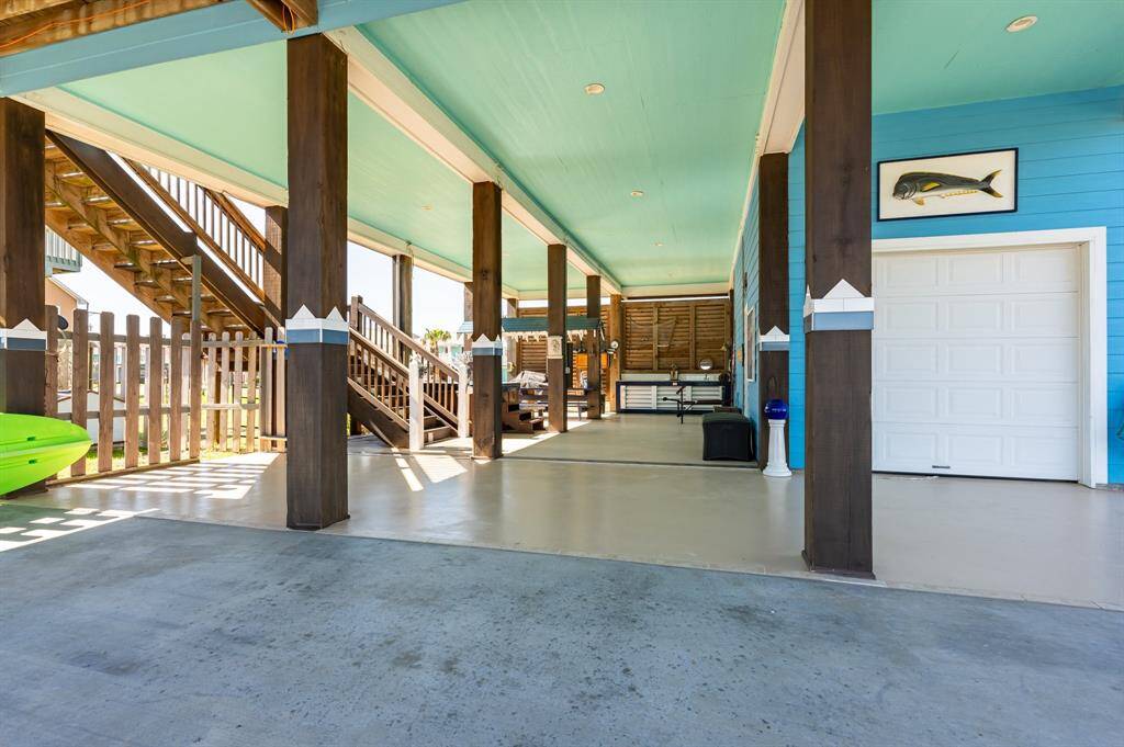 Down Stairs.  Large enough to Entertain, Park Cars, Outside Kitchen , Sand Shower, Hot Tub, Nice Landscaping, Well Maintained Lawn. 2 Lots.