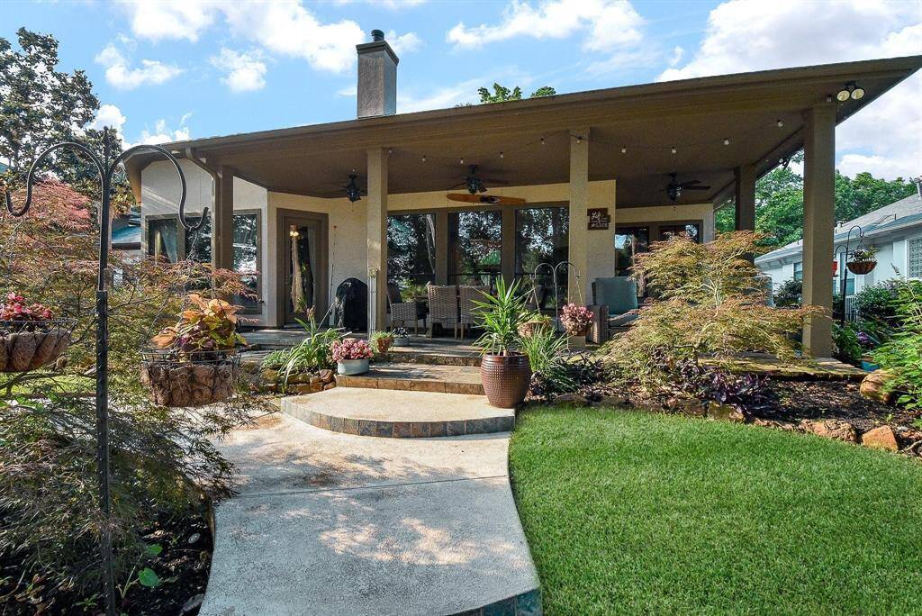 covered patio overlooking this amazing yard