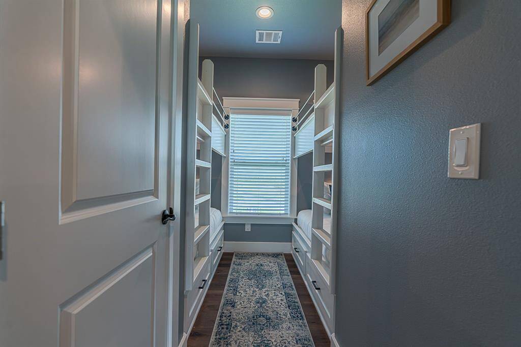 Fourth bedroom with built-in bunk beds