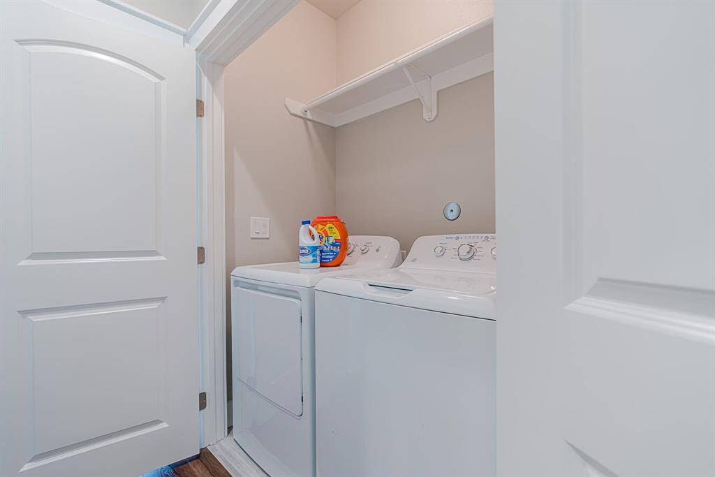 Laundry space behind double doors