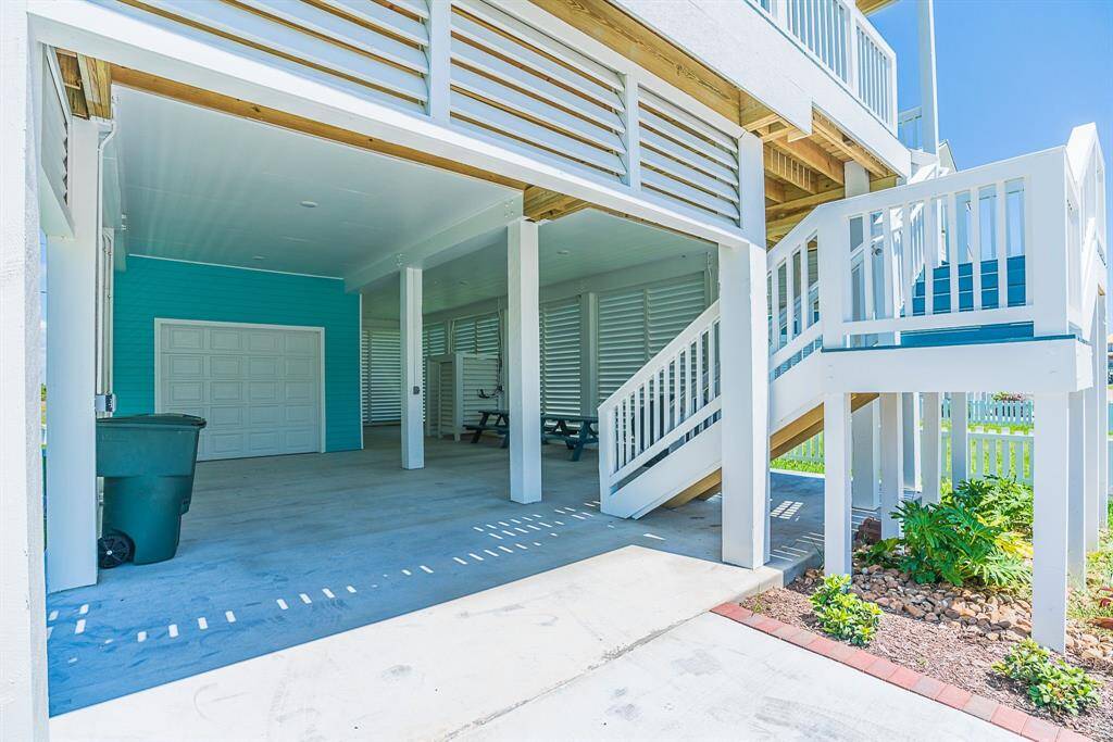 Carport/Garage, outdoor covered seating and shower!