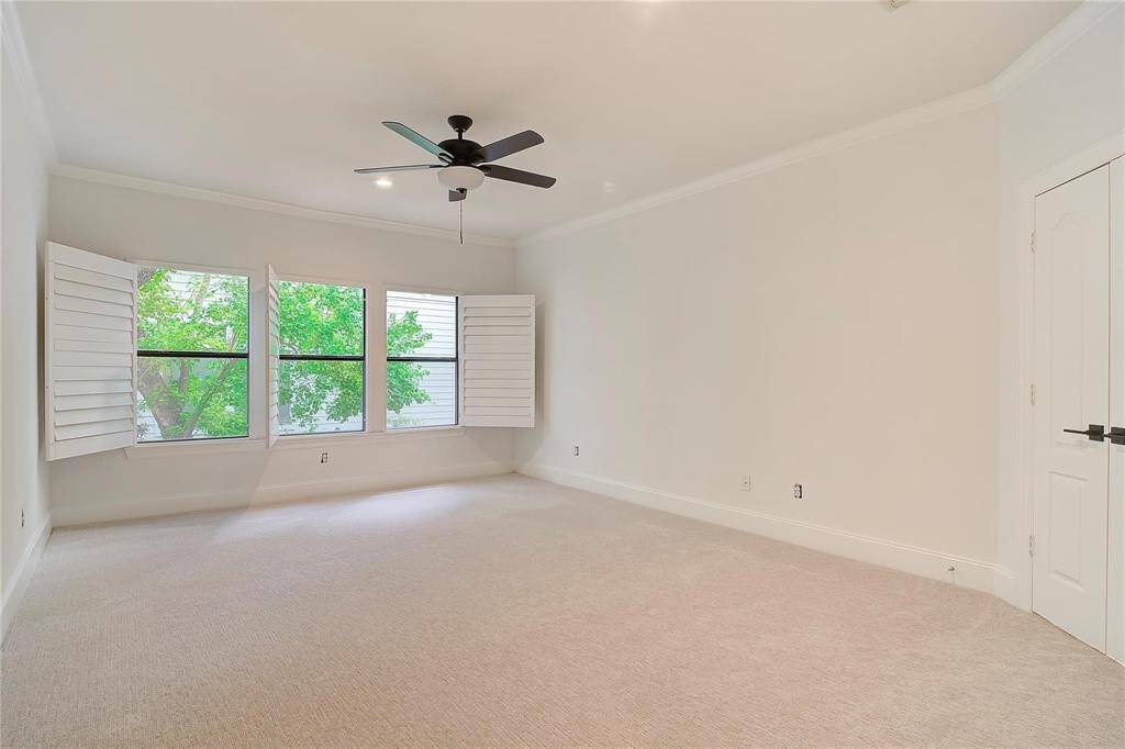 Large bedroom with plenty of natural light.