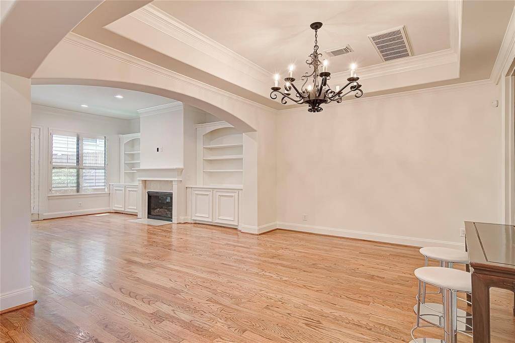 Large first floor dining and living room with an abundance of natural light.