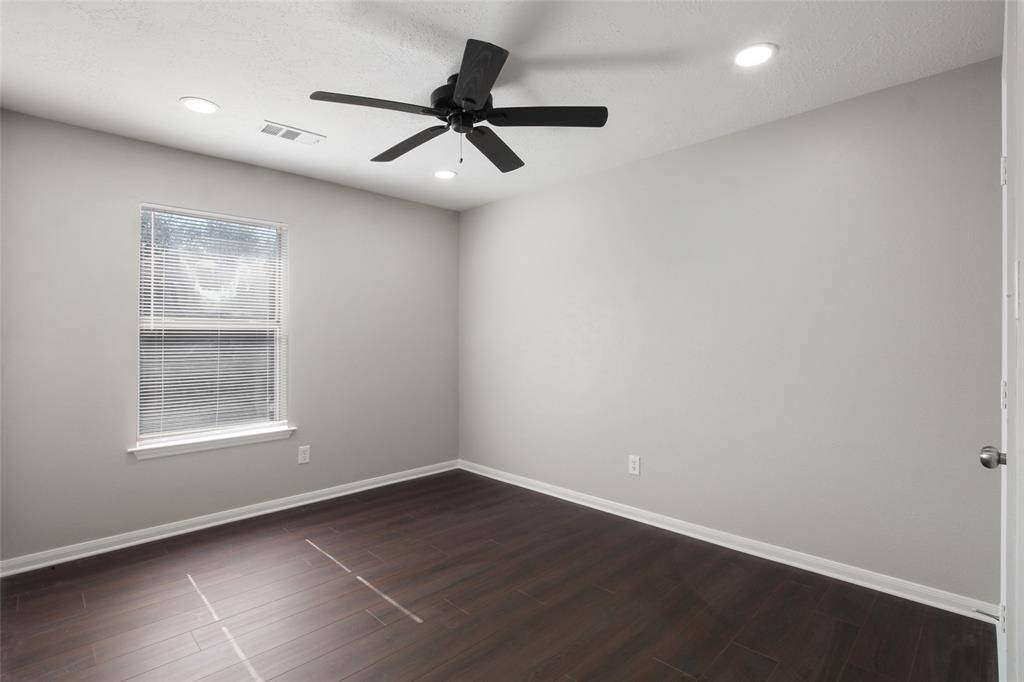Another Upstairs Bedroom...3 Bedrooms Upstairs... with Wood Flooring.