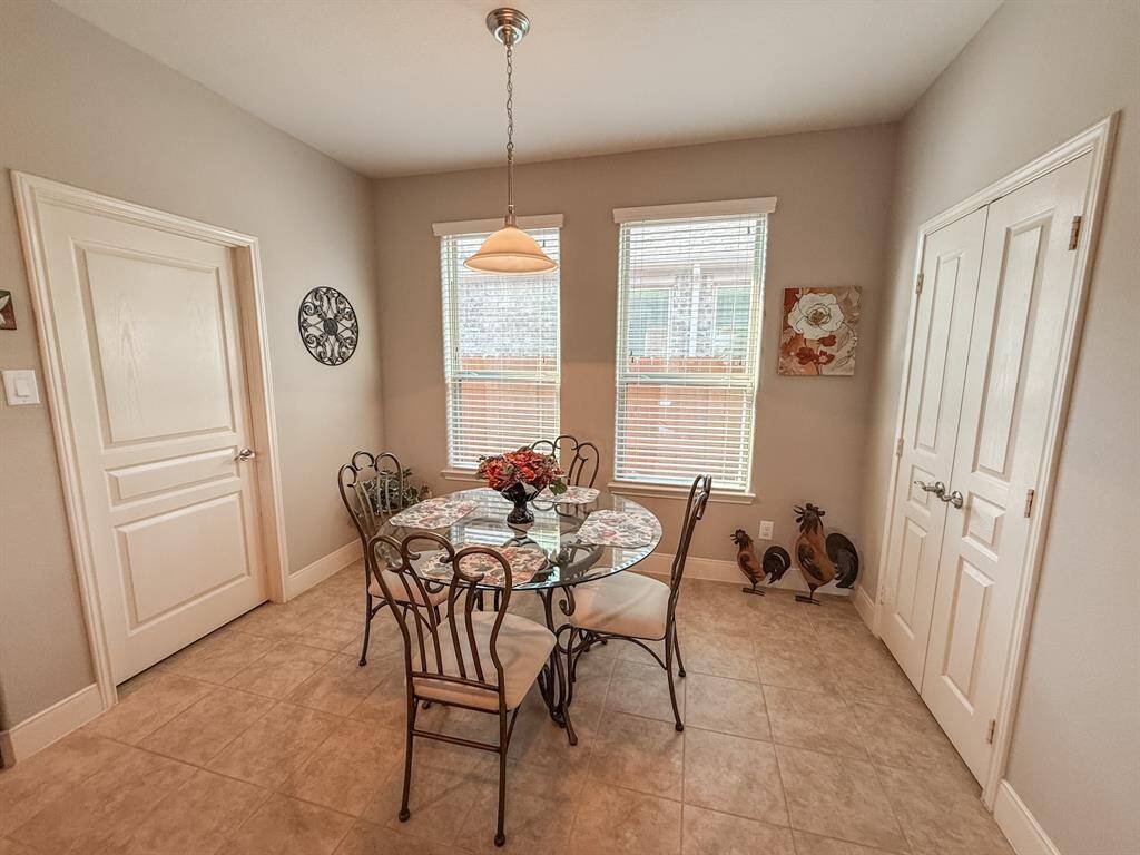 The breakfast room is so sunny!  The pantry has double doors and room for all of your needs.