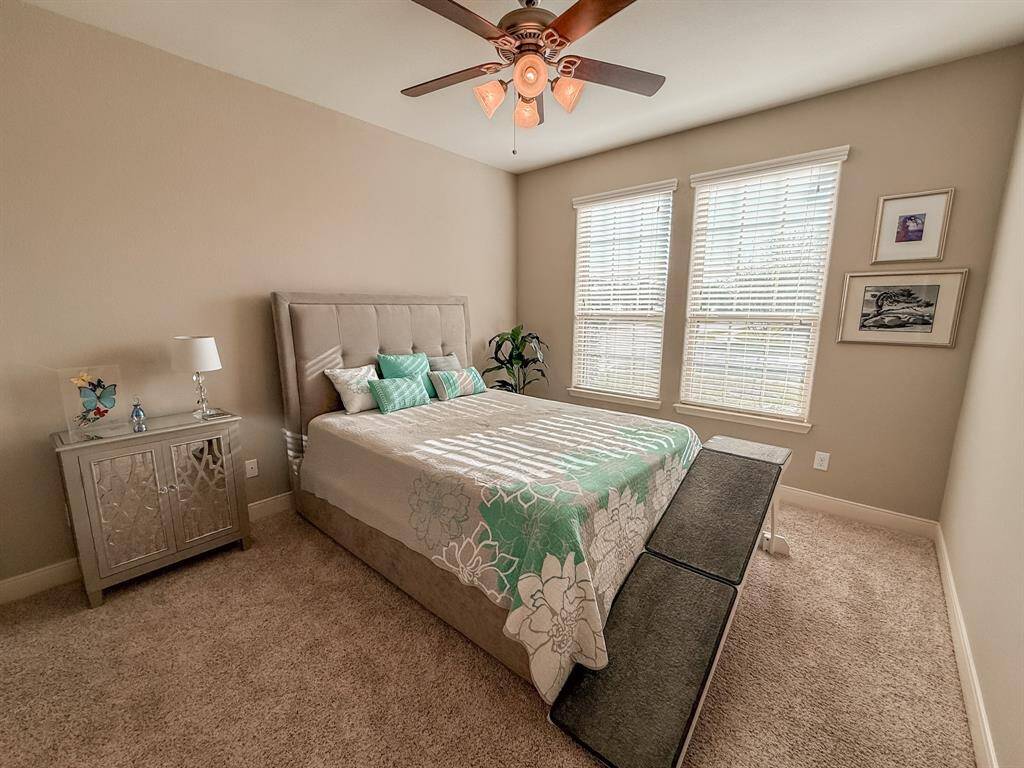 The secondary bedroom is at the front of the house and also has recent carpet and an ensuite bath.