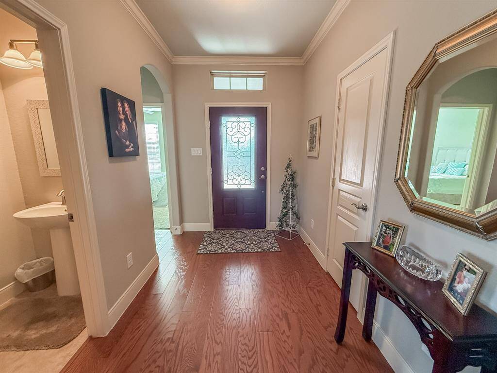 Come on in! Note the pretty engineered hardwood floors.