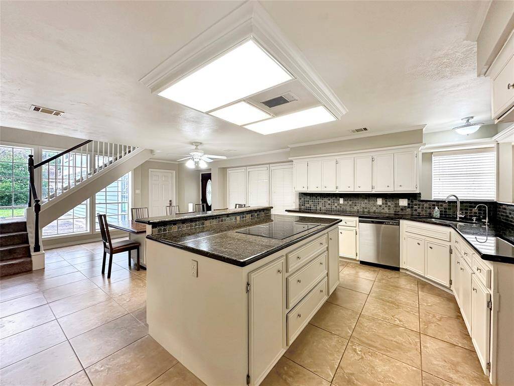 Island is also designed with a lifted counter to add in high top stools for additional seating
