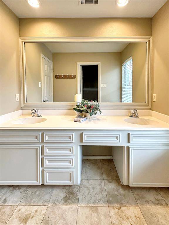 Secondary restroom is located upstairs