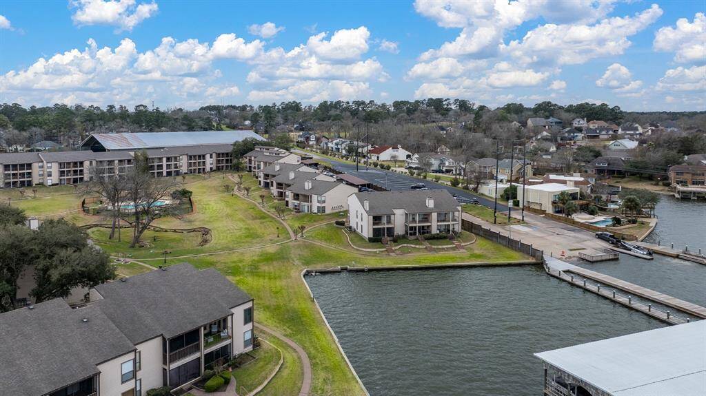Welcome to 203 Lakeview Terrace Unit 203B located in the gated golf and lake community of April Sound. This second story 2 bedroom, 2 bath unit has views of both Lake Conroe and the community pool. Nestled in a quiet community, this condominium is move in ready.
