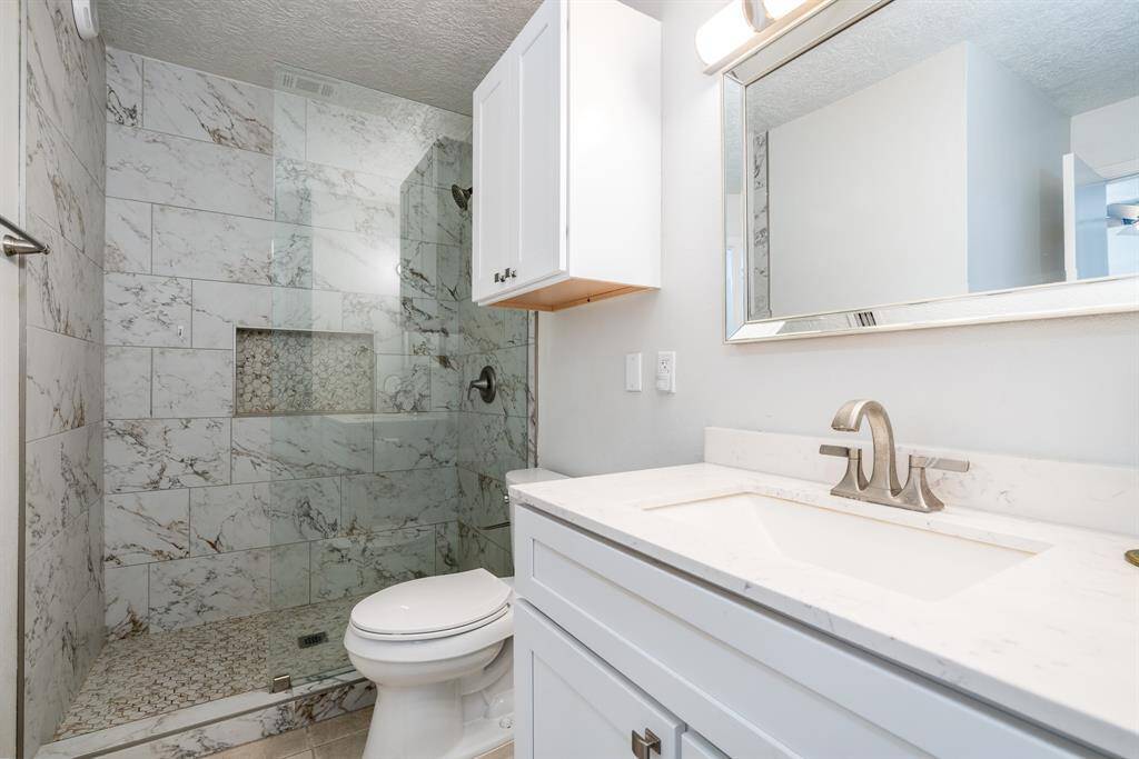 The secondary bath has been redone as well in a similar style to the the primary.