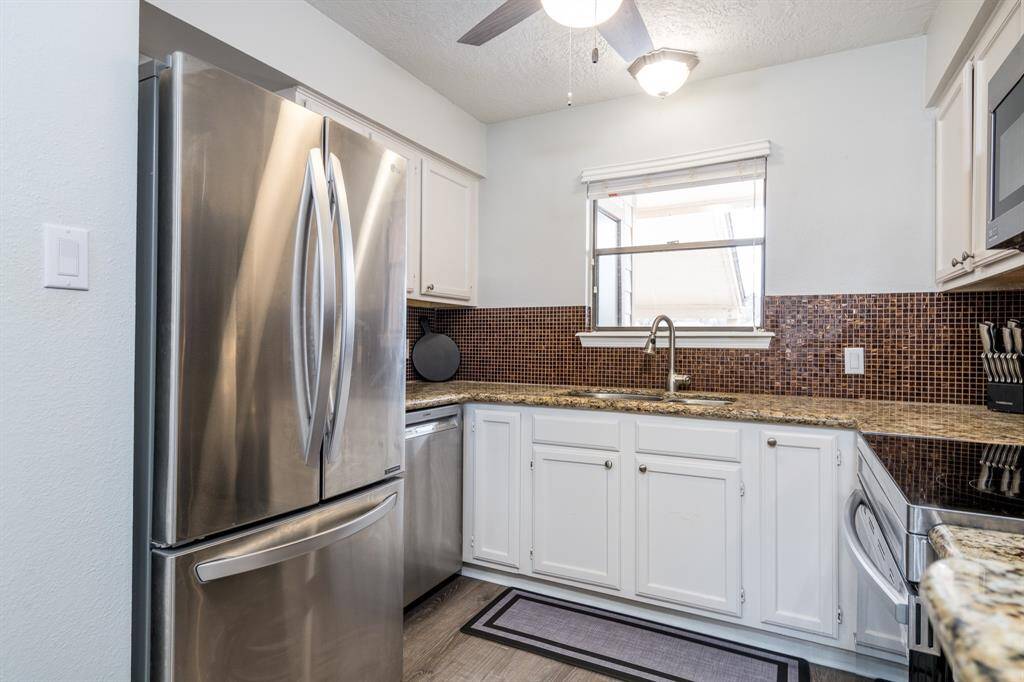 Another view of the kitchen and the open and efficient layout.