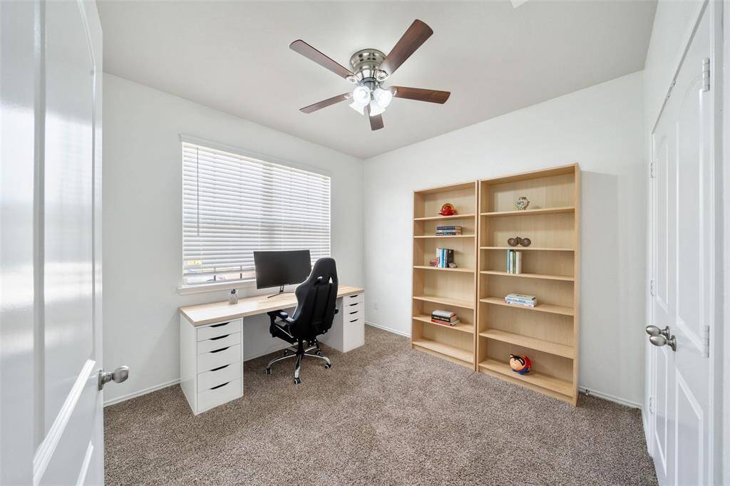 The front bedroom, which can also serve as a study or flex space, adds extra versatility to suit your needs.