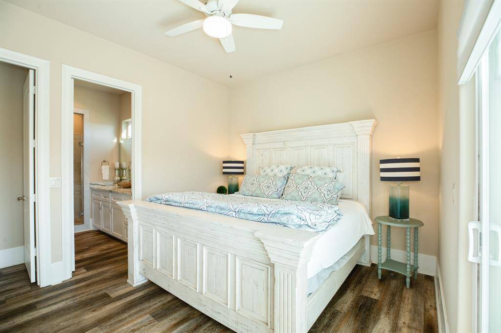 The primary bedroom  has a separate entrance and deck access.