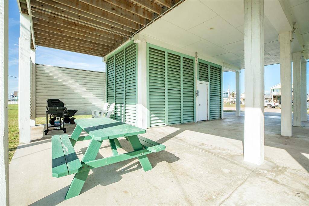 There is a one car garage that is perfect for storing your golf cart and a downstairs bathroom with shower.