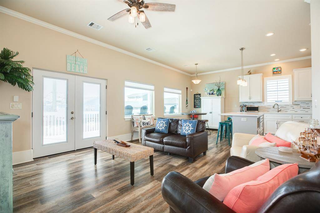 The living room is open to the dining space and kitchen.