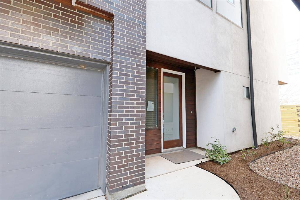 The rear property layout provides seamless access to your garage for added convenience.