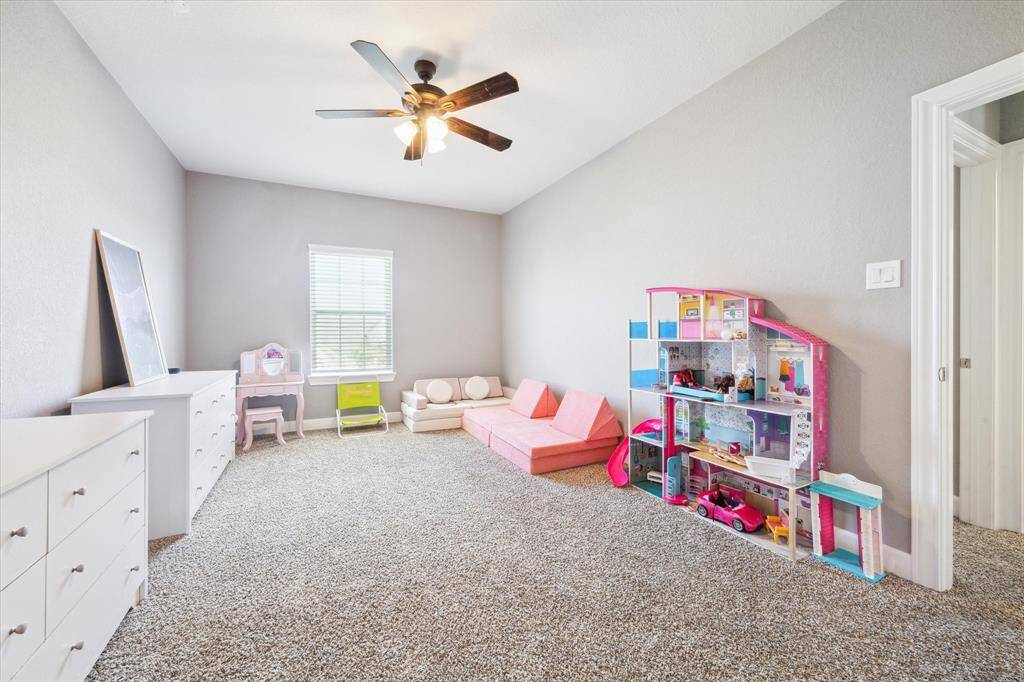 Second of three upstairs bedrooms is also oversized at 11' x 17'.  Currently being used as a playroom.